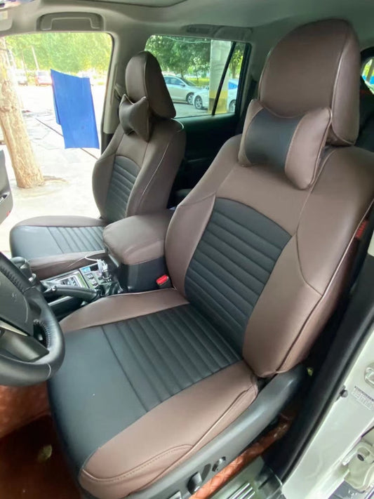 Front seats of Toyota Landcruiser Prado fitted with custom coffee and black artificial nappa leather seat covers