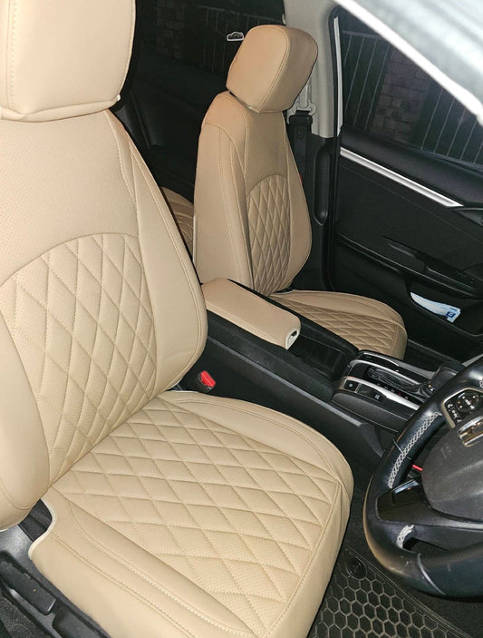 Front seats of 2019 Honda Civic fitted with beige artificial Nappa leather seat covers featuring diamond stitching