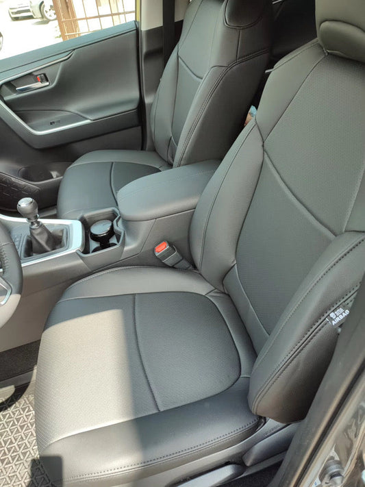 Front seats of 2020 Toyota RAV4 covered in gray artificial Nappa leather with precise stitching and perforated panels