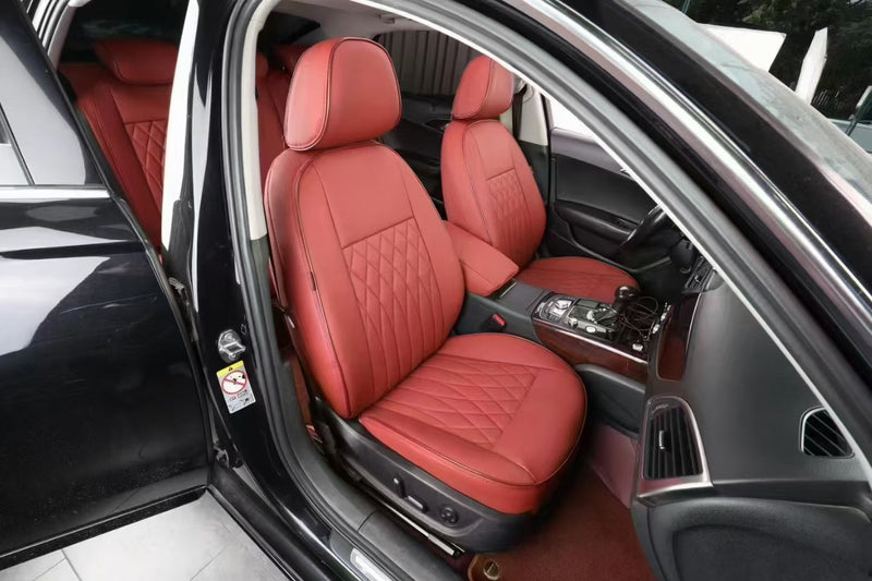 Audi A3 front seats with custom red artificial Nappa leather seat covers featuring diamond stitching and precise fit
