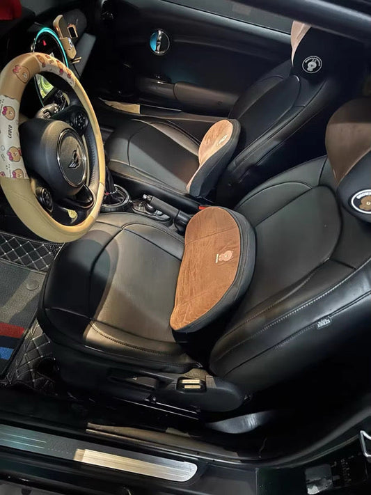 Front driver and passenger seats with custom black artificial nappa leather seat covers and brown suede cushions