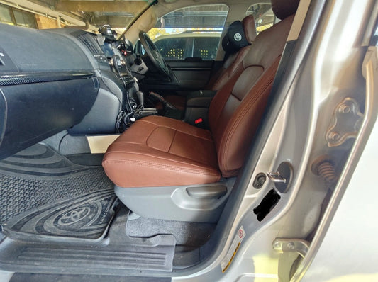 Brown artificial Nappa leather front seat cover fitted on Toyota Landcruiser Prado driver side