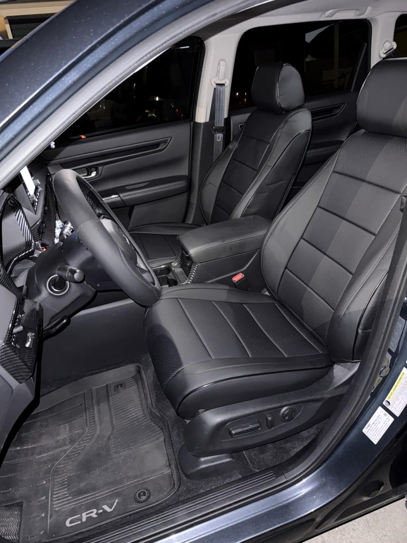 Front seats of Honda CR-V with custom black artificial Nappa leather seat covers showing perforated and smooth panels
