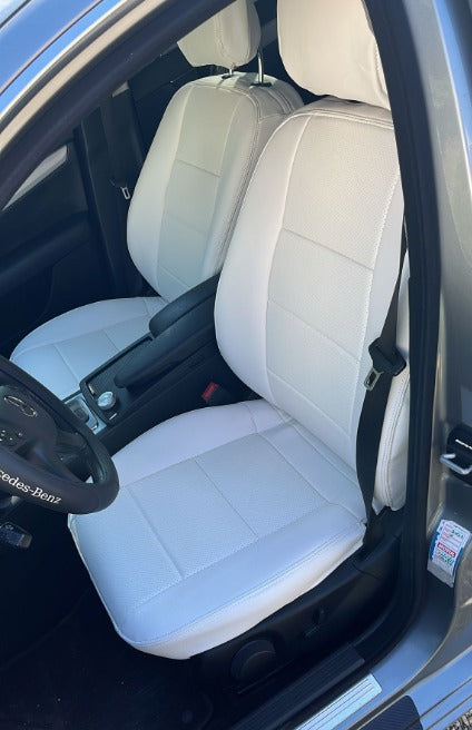 Front Mercedes Benz C320 seats covered with custom white artificial Nappa leather seat covers