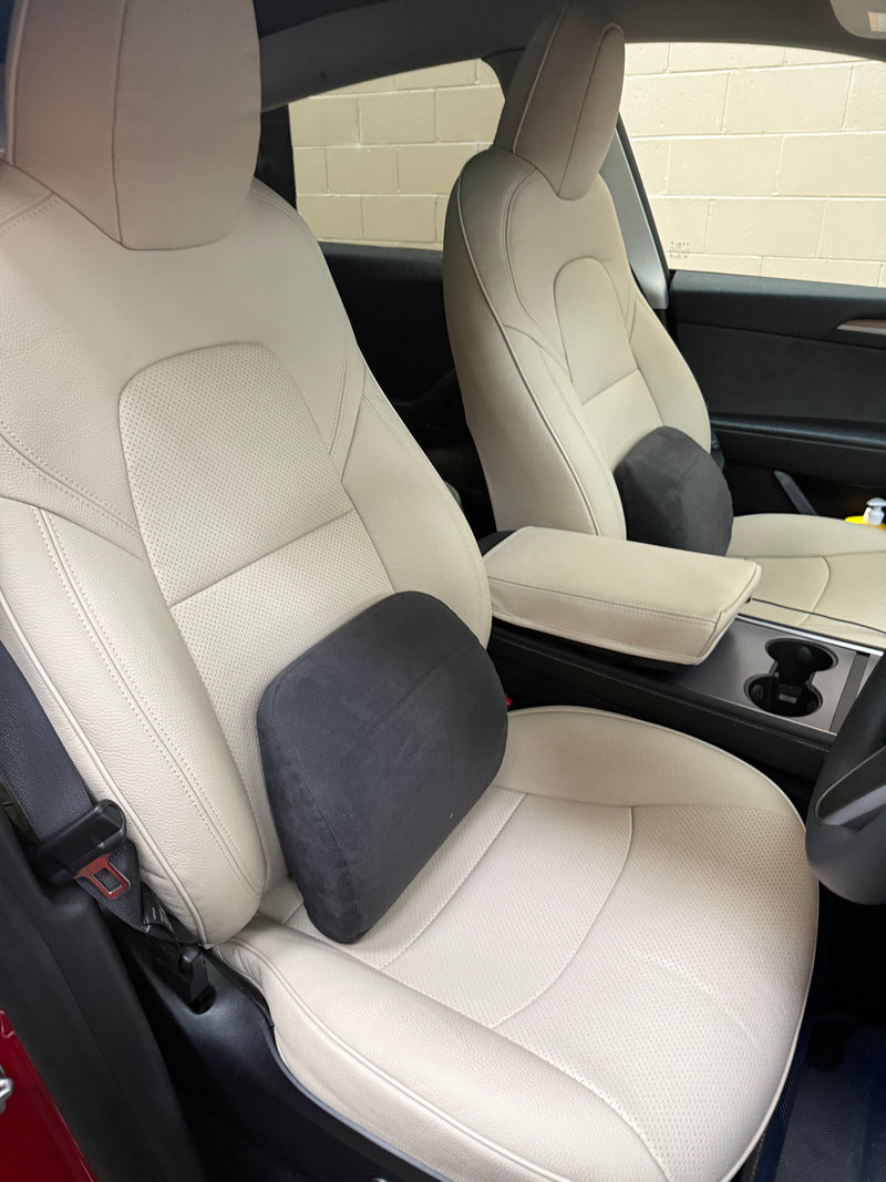 Close-up of custom fit beige Italian cowhide leather seat covers on Tesla Model Y front seats