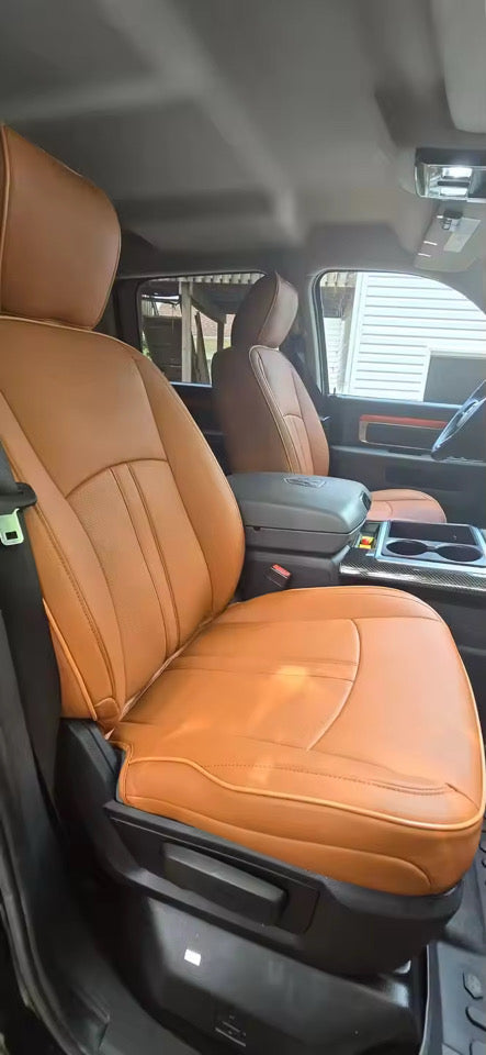 Front bucket seats in RAM 1500 with caramel artificial nappa leather seat covers